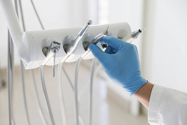 Professional Tooth Extraction technician working in Fabens, TX